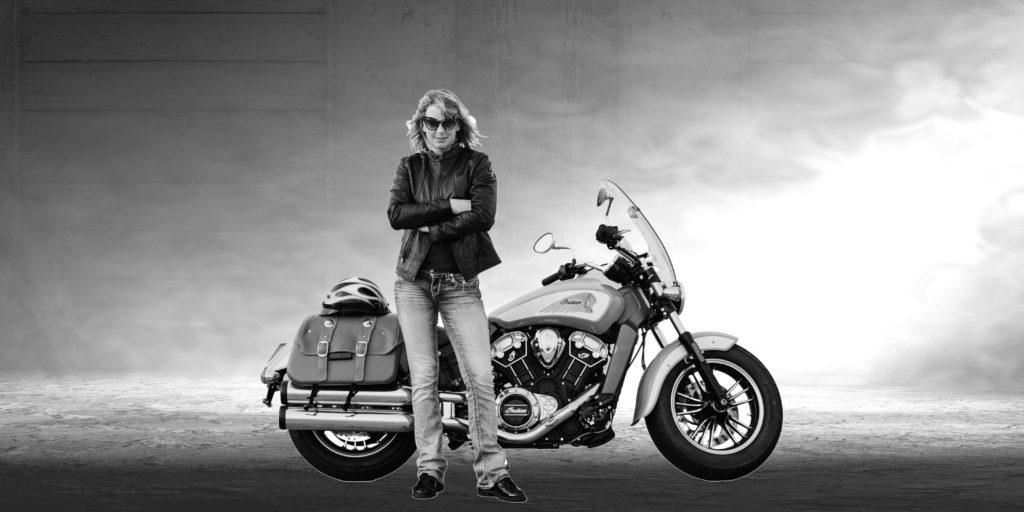 Andi-sitting-on-her-motorcycle-